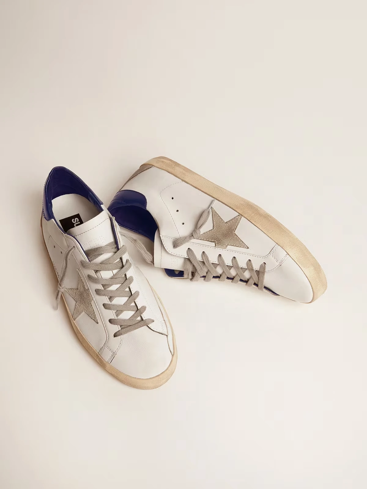 Mens Super Star with suede star and blue heel tab